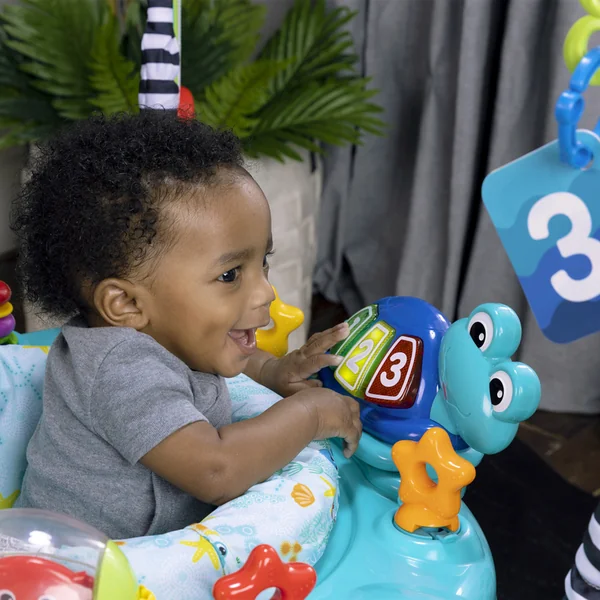 BABY EINSTEIN Jumper/Centre d'activités 2-en-1 Curiosity Cove™ 6m+ jusqu'à 11kg