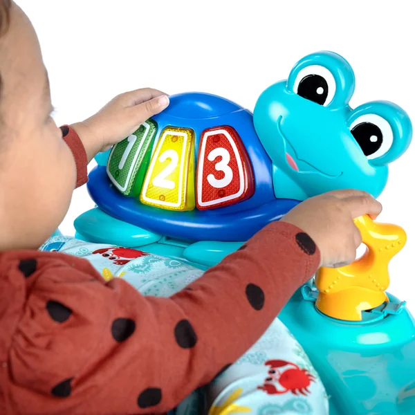 BABY EINSTEIN Jumper/Centre d'activités 2-en-1 Curiosity Cove™ 6m+ jusqu'à 11kg