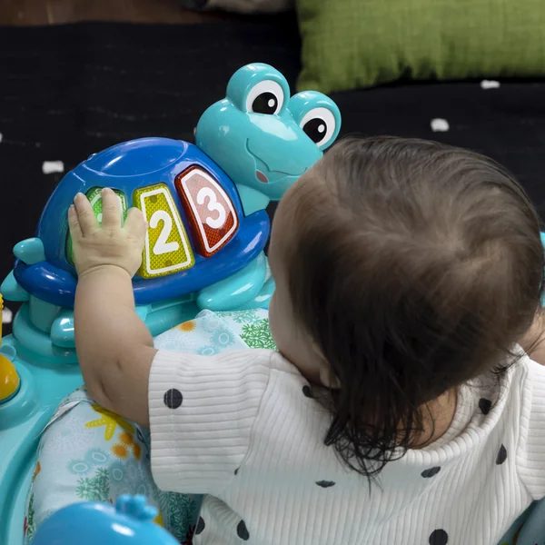 BABY EINSTEIN Jumper/Centre d'activités 2-en-1 Curiosity Cove™ 6m+ jusqu'à 11kg