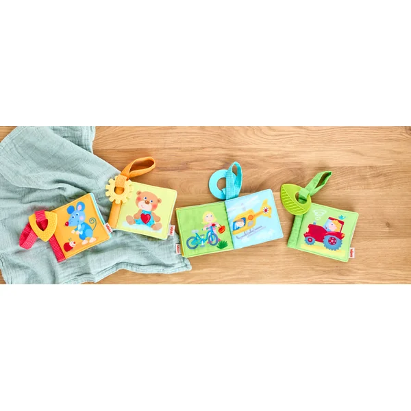 Haba Livre en tissu pour poussette avec anneau de dentition Premiers mots