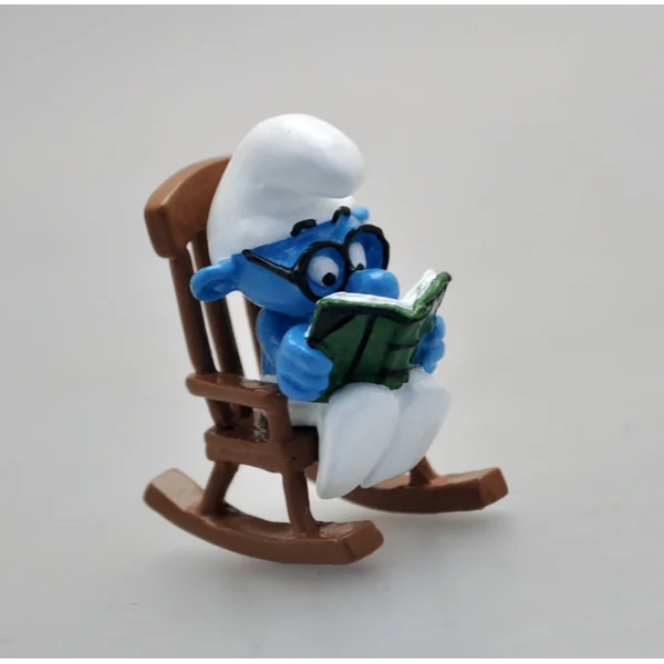 LES SCHTROUMPFS: LE SCHTROUMPF A LUNETTES DANS LE ROCKING-CHAIR, COLLECTION ORIGINE III - figurine métal