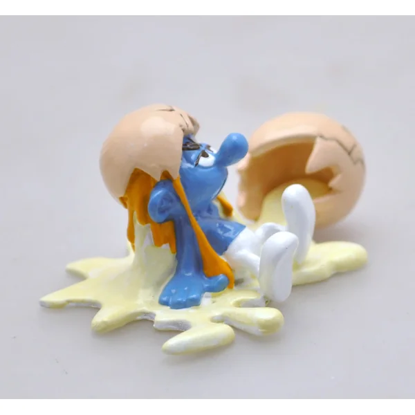 LES SCHTROUMPFS: LE SCHTROUMPF ET L'OEUF CASSE, COLLECTION ORIGINE III - figurine métal