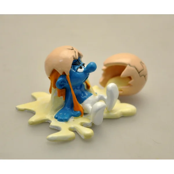LES SCHTROUMPFS: LE SCHTROUMPF ET L'OEUF CASSE, COLLECTION ORIGINE III - figurine métal