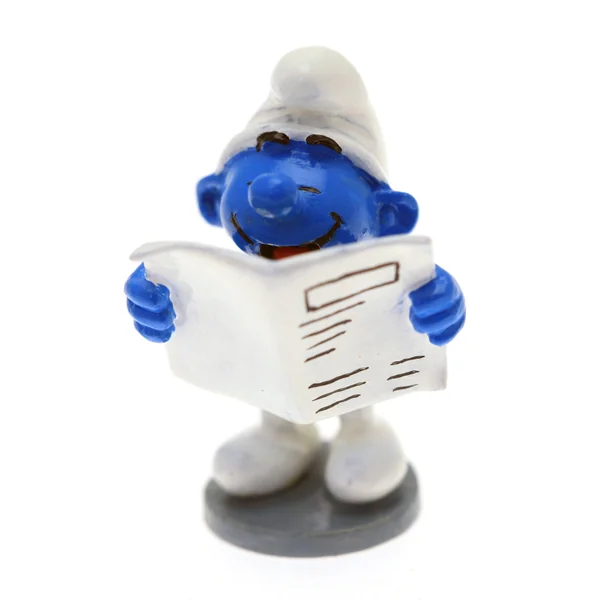 LES SCHTROUMPFS: LE SCHTROUMPF LISANT UN JOURNAL, COLLECTION ORIGINE #2 - figurine métal 3.5 cm